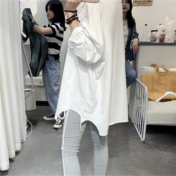 Široka ženska bluza dugih rukava bijele boje