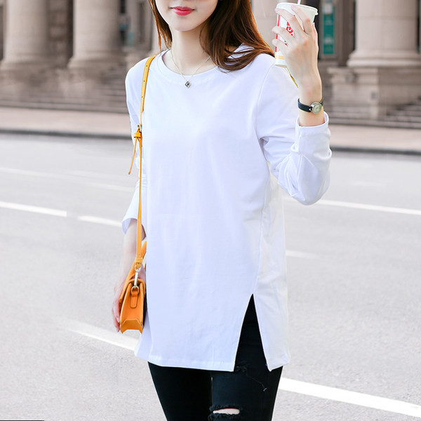 Ležerna ženska bluza s prorezom i dugim rukavima u bijeloj boji