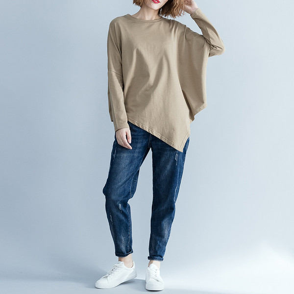 Ženska široka bluza s dugim rukavima i okruglim izrezom