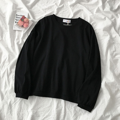 Jednobojni model ženske bluze dugih rukava