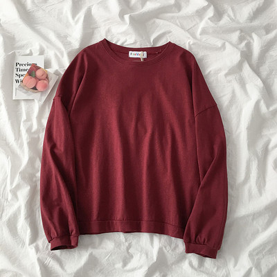 Jednobojni model ženske bluze dugih rukava