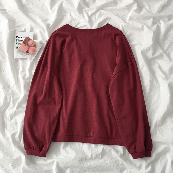 Jednobojni model ženske bluze dugih rukava