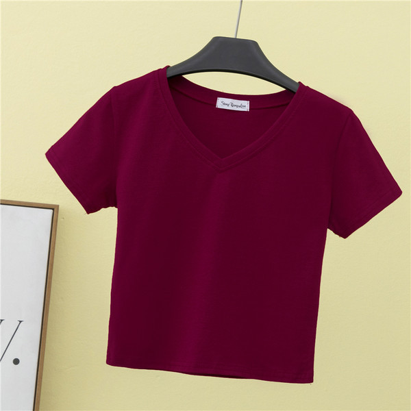 Kratka pripijena bluza sa špic izrezom