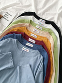 Jednobojna ženska bluza dugih rukava i okruglog dekoltea