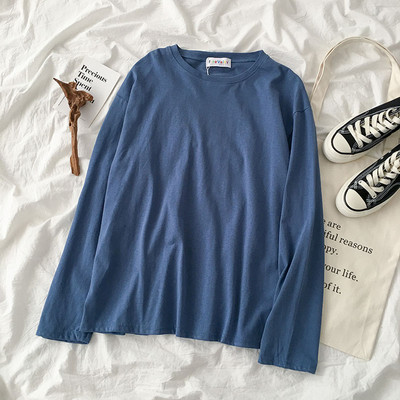 Jednobojna ženska bluza dugih rukava i okruglog dekoltea