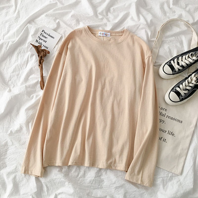 Jednobojna ženska bluza dugih rukava i okruglog dekoltea
