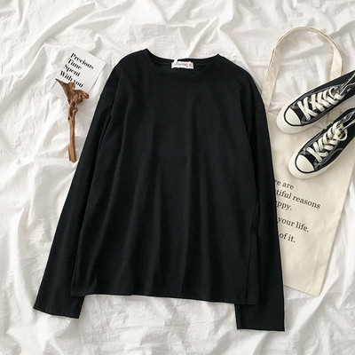 Jednobojna ženska bluza dugih rukava i okruglog dekoltea