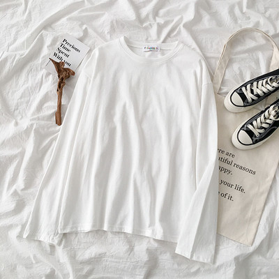 Jednobojna ženska bluza dugih rukava i okruglog dekoltea