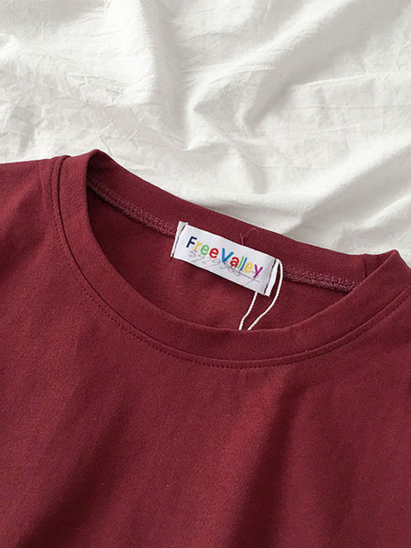 Jednobojna ženska bluza dugih rukava i okruglog dekoltea