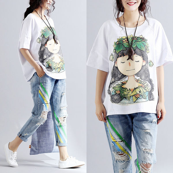 Ležerna ženska bluza s aplikacijom u boji - široki model