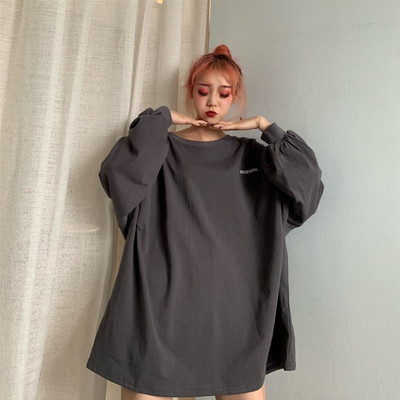 Γυναικεία μπλούζα με στρογγυλή λαιμόκοψη και φαρδιά μανίκια