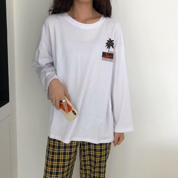 Proljetna pamučna bluza s dugim rukavima i aplikacijom