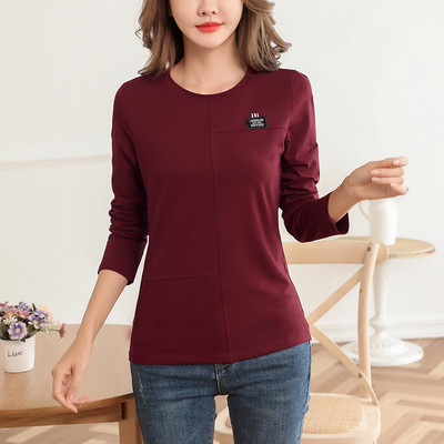 Casual μπλούζα με οβάλ λαιμόκοψη και μακριά μανίκια