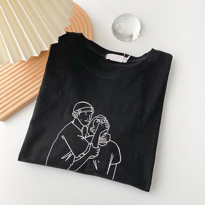 Casual γυναικείο μπλουζάκι με απλικέ και στρογγυλή λαιμόκοψη