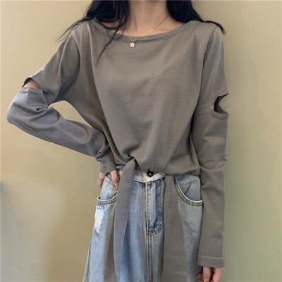 Proljetno-jesenska bluza s izrezanim motivima