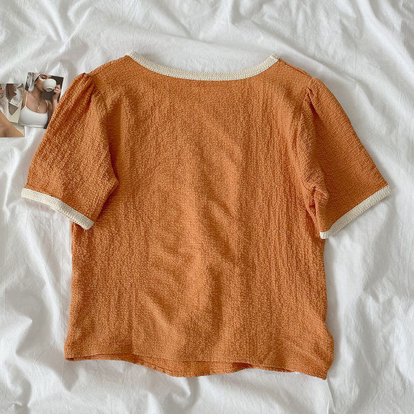 Γυναικεία μοντέρνα μπλούζα με κοντά μανίκια και στρογγυλή λαιμόκοψη