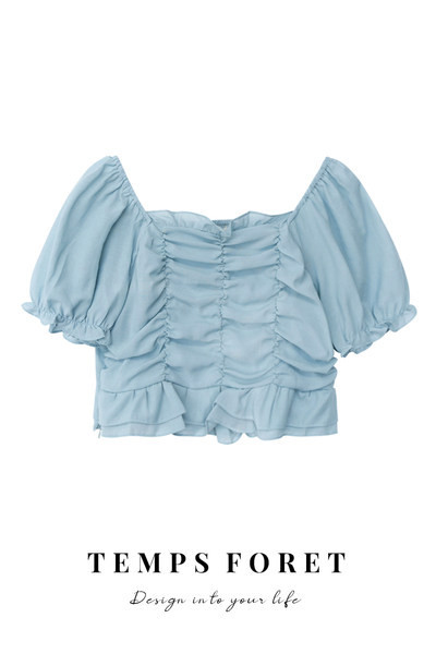 Κομψή γυναικεία μπλούζα με σετ και μανίκια