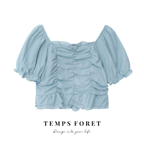 Κομψή γυναικεία μπλούζα με σετ και μανίκια