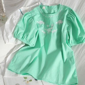 Moderna ženska bluza s cvjetnim vezom i okruglim izrezom