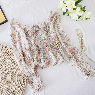 Ženska ležerna bluza golih ramena i cvjetnog uzorka