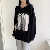 Proljetna široka bluza s aplikacijom