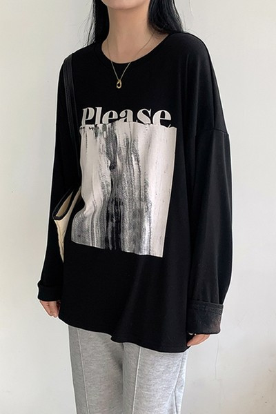 Proljetna široka bluza s aplikacijom