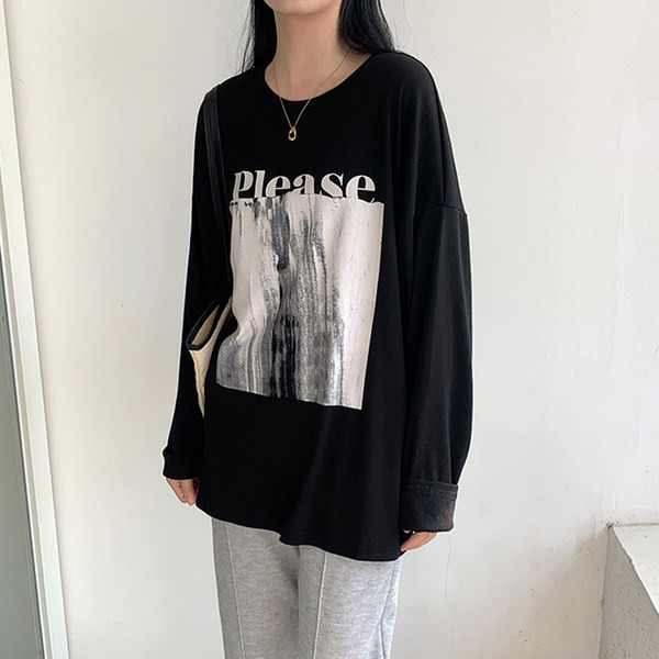 Proljetna široka bluza s aplikacijom