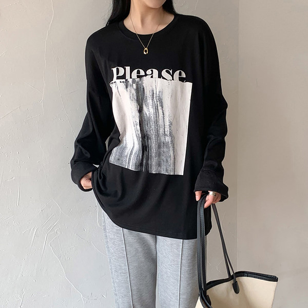 Proljetna široka bluza s aplikacijom