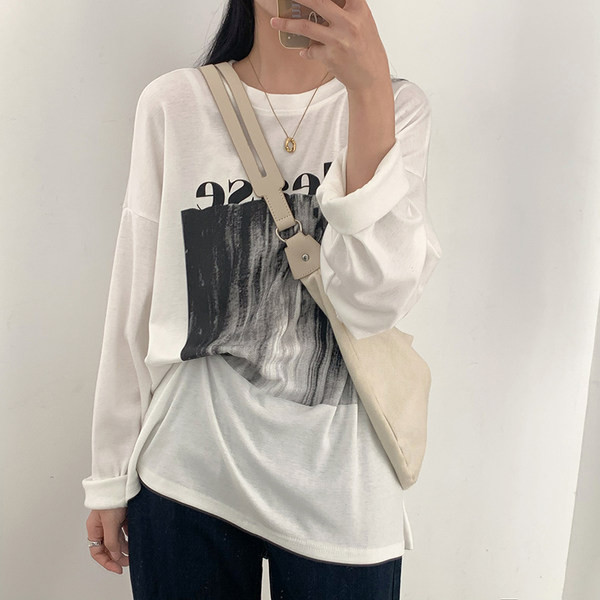 Proljetna široka bluza s aplikacijom