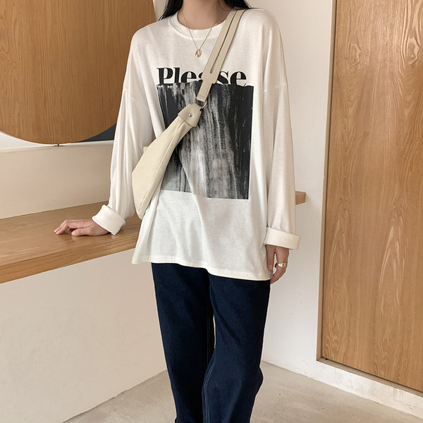 Proljetna široka bluza s aplikacijom