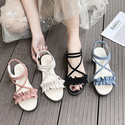 Ženske ležerne sandale s ravnim potplatom i kovrčama