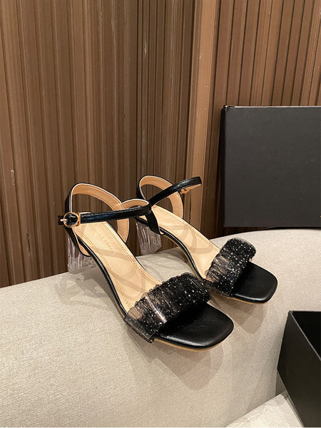 Moderne ženske sandale sa tilom i sjajnim česticama