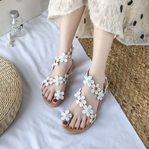 Ležerne ženske sandale s cvjetnim ukrasom i ravnim potplatom