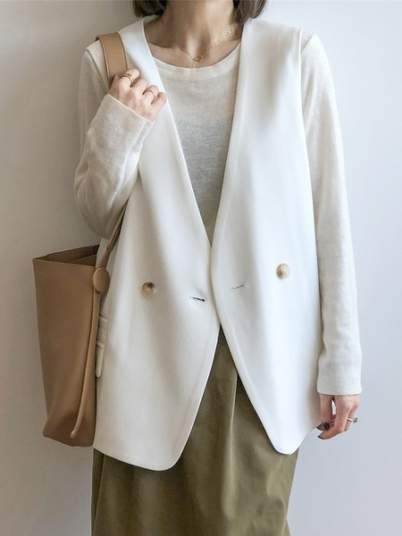 Ženski elegantni prsluk s gumbima u nekoliko boja