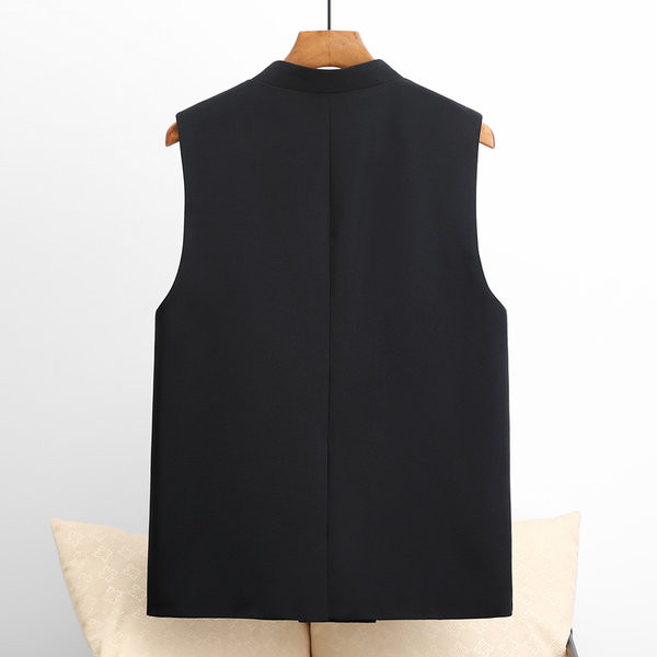 Moderan proljetni prsluk s dvorednim kopčanjem i džepovima