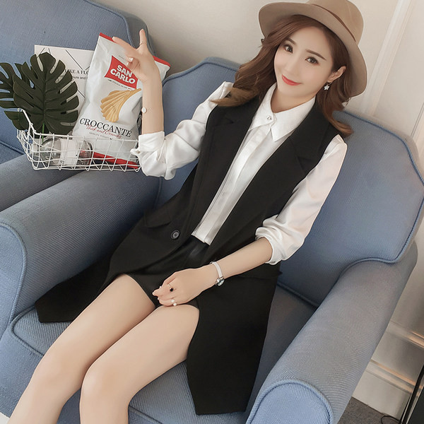 Μοντέρνο μακρύ γιλέκο με κουμπιά και τσέπες