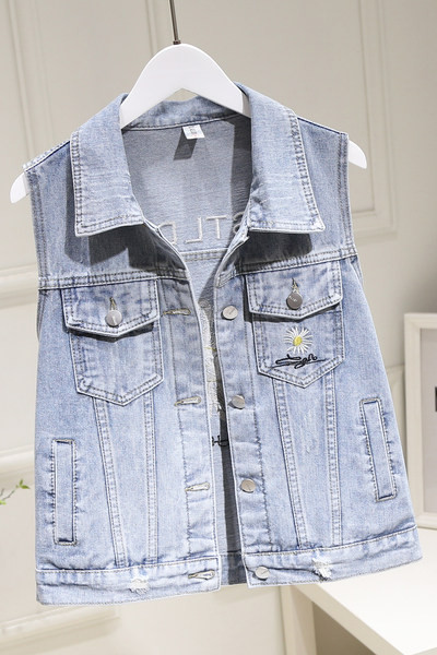 Ženski traper prsluk s džepovima i vezom