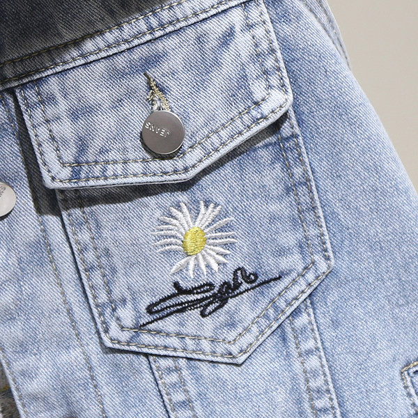 Ženski traper prsluk s džepovima i vezom