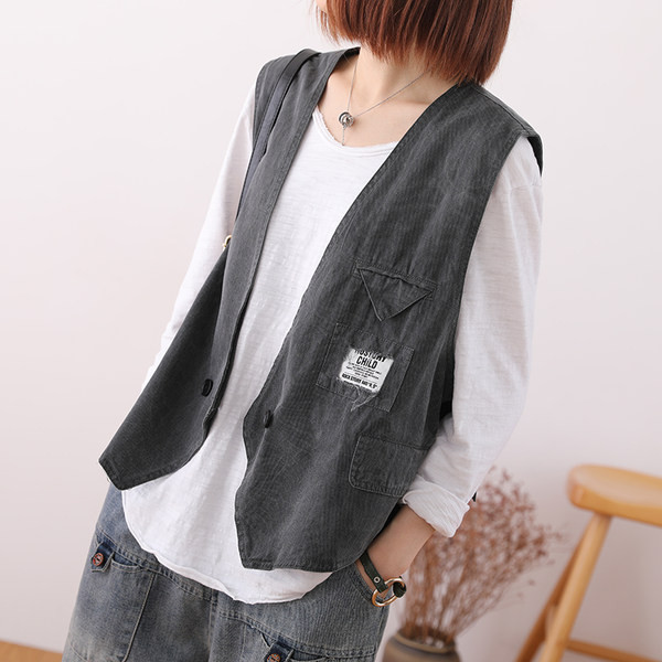 Ženski prsluk s gumbima u plavoj i sivoj boji