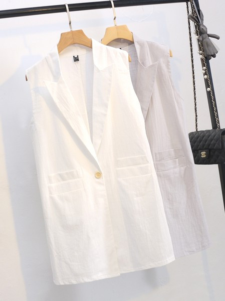 Dugi ženski prsluk s gumbima i džepovima