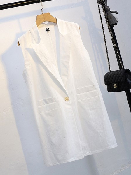 Dugi ženski prsluk s gumbima i džepovima