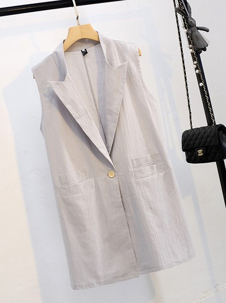 Dugi ženski prsluk s gumbima i džepovima