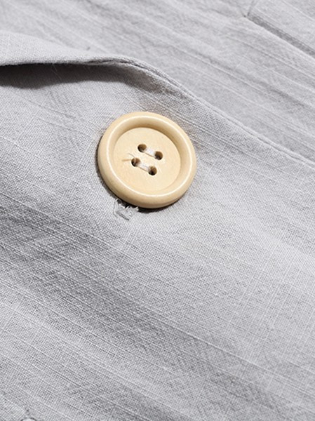 Dugi ženski prsluk s gumbima i džepovima