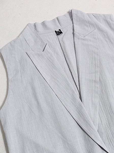 Dugi ženski prsluk s gumbima i džepovima