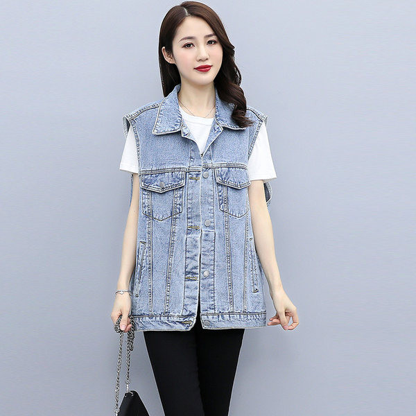 Široki model ženske vestice od trapera s džepovima