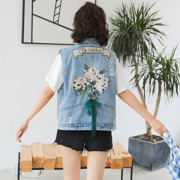 Ženski traper prsluk s vezom i džepovima