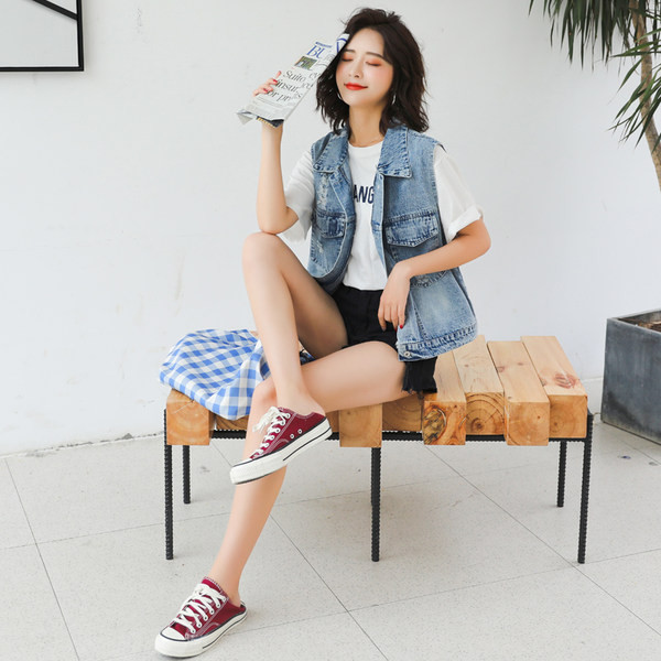 Ženski traper prsluk s vezom i džepovima