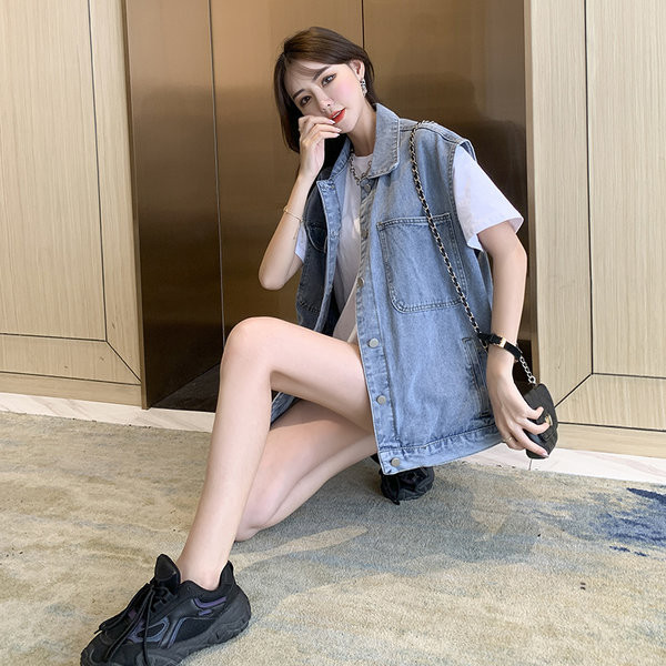 Μεγάλο γυναικείο γιλέκο με τσέπες και κουμπιά