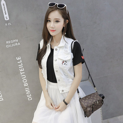 Γυναικείο γιλέκο τζιν με σχισμένο μοτίβο σε μπλε και άσπρο χρώμα