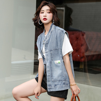 Γυναικείο γιλέκο τζιν με φερμουάρ και τσέπες